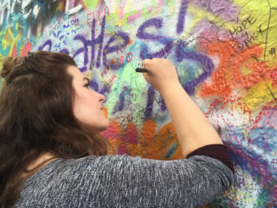Writing on the John Lennon Wall in Prague