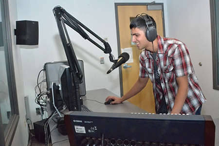 Fernando DJing at the College of Journalism and Mass Communication.