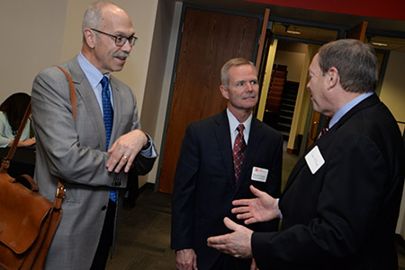Dr. Richard DeFusco (left) facilitates the panel discussion at the next Executive Insights.