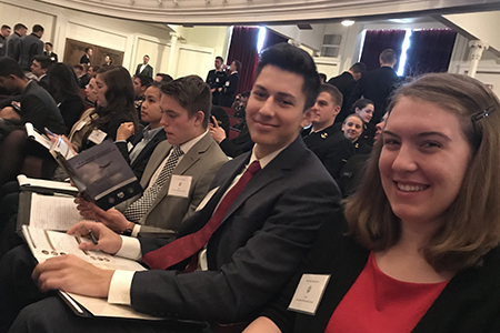 From left: Jess Nguyen, David Petersen, Conrad Shiu and Libby Schwemmer prepare to hear a session at the U.S. Naval Academy Leadership Conference.