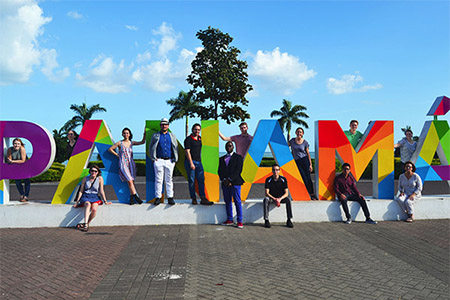 Osiri surrounded by his students on a trip to Panama.