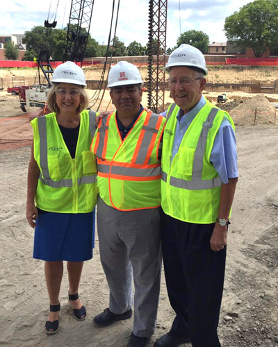Dean Plowman, Rik Barrera and Plowman's father at construction site