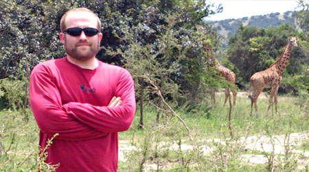 Al Baghal in Rwanda with giraffes