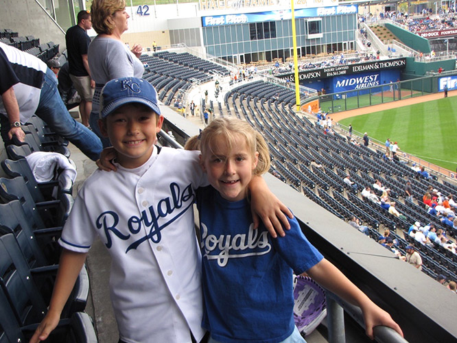 Natives of Leawood, Kansas, Thomas Wolfe (left) and his sister Lucía (right), have long been avid fans of the Kansas City Royals.