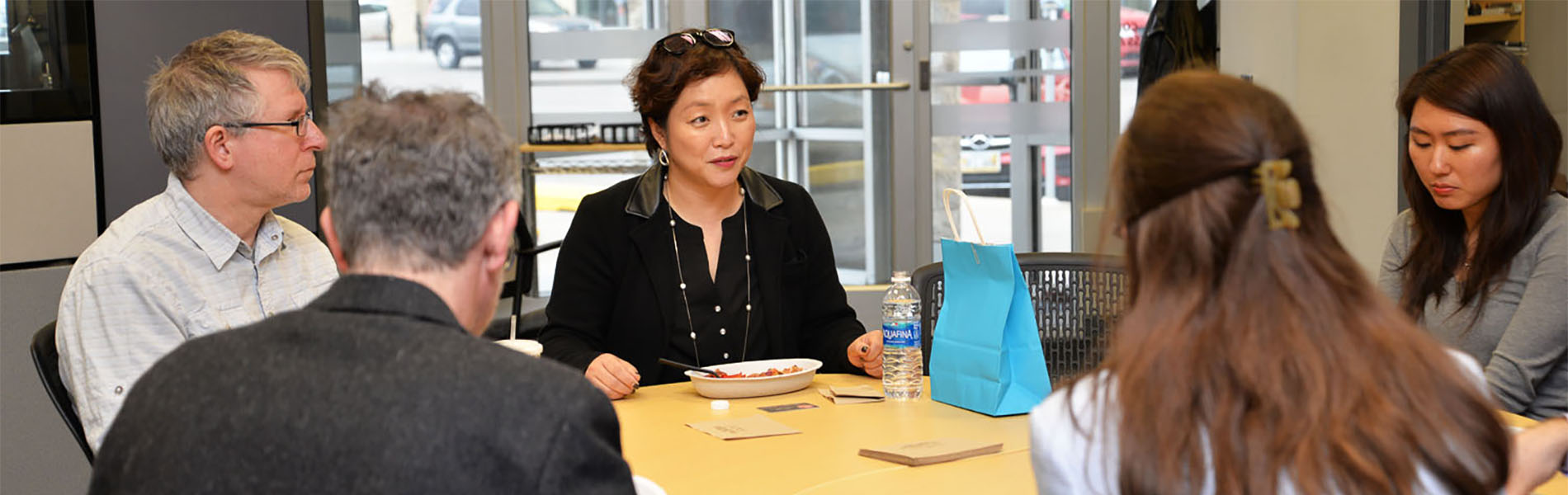 Suji Park consults with students
