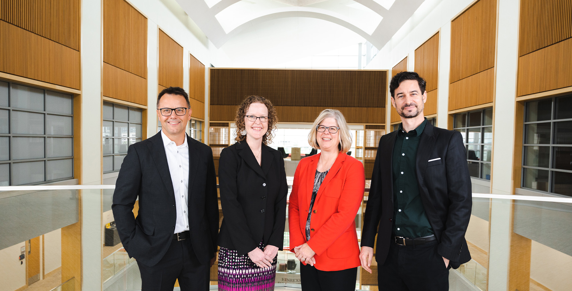Banner image of the four Seacrest Teaching Fellows on the fifth floor of Howard L Hawks Hall.