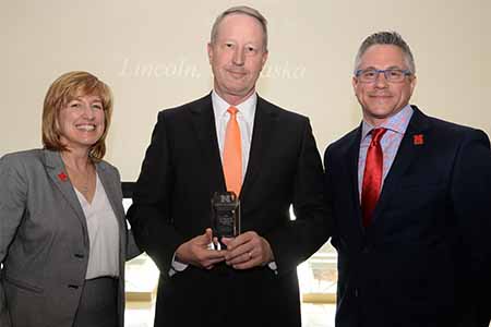 Dean Kathy Farrell, Kevin Karas, chief financial officer, representing NRC Health winner of the Corporate Leadership Award and Jeff Noerdhoek, CEO of Nelnet and chairman of the Dean’s Advisory Board.