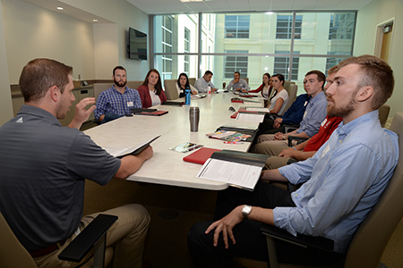 Brandon Urry meets with the new MAIAA cohort during orientation.