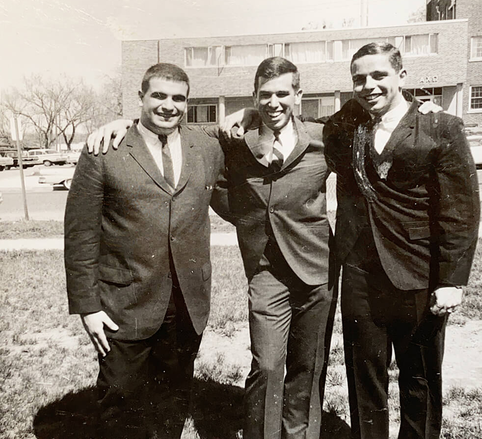 Roger Smith (middle) poses on graduation day with two of his fraternity brothers, including Pete Sommerhauser, ’77 (left).