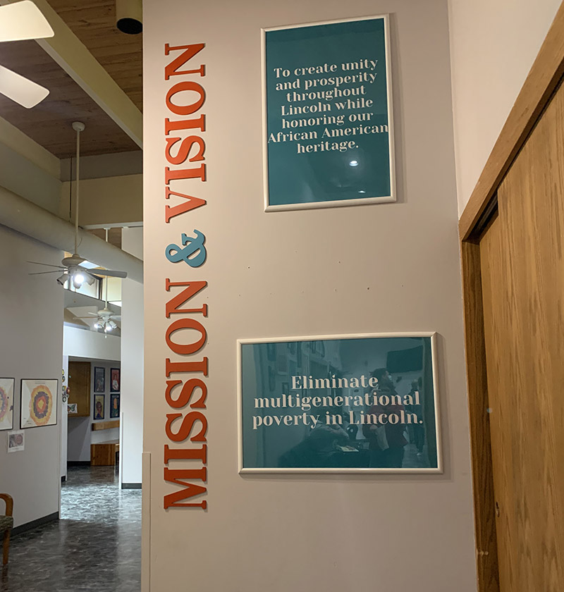 The mission and vision are prominently displayed in the Malone Community Center.  