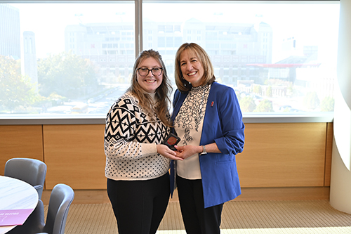 Addie Weiand, junior management major, received a Dean's Coin and was named Student of the Month. 