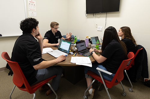 University of Denver students work together to prepare their recommendations.