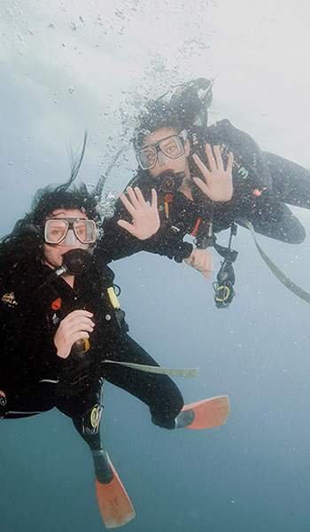 Hallie and her sister, Anna, scuba dive at the Great Barrier Reef off the coast of Cairns.