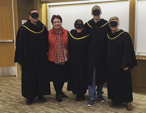 Dr. Elina Ibrayeva receives the Professor of the Month award from Mortar Board students.