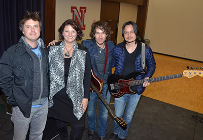 Gooding with NCEE president Jennifer Davidson and band