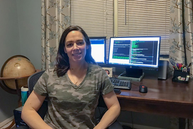 Moved to remote teaching and learning due to COVID-19, Bernard cozily set herself up in her home office. 