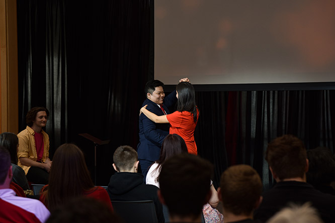 Nguyen dances onstage with Anamaría Guzmán, another We Are Nebraska intern, sharing a special moment he never received in high school.