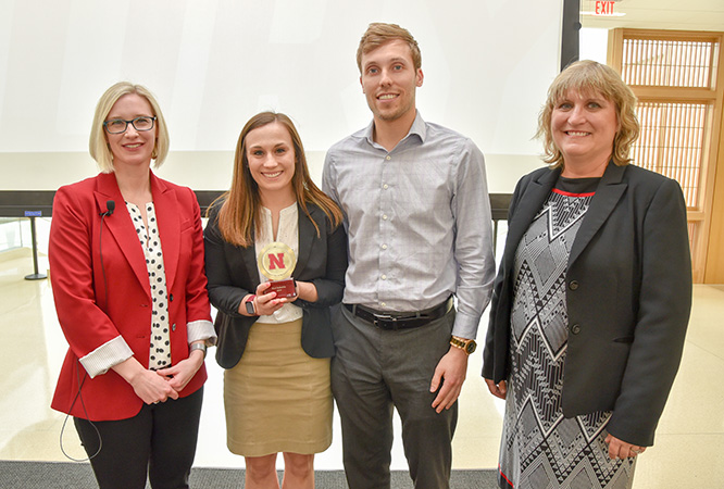 Kara Mosley, ’14, and Brian Harshman,’15, accepted the Employer of the Year Award on behalf of Koch Industries.