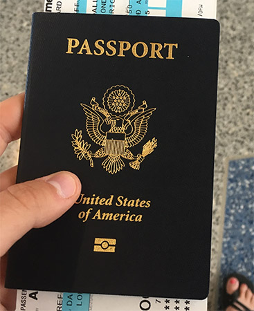 Greff has her passport in hand.