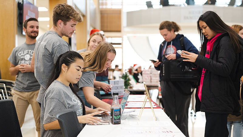 Students in the Clifton Builders group help interested other students.