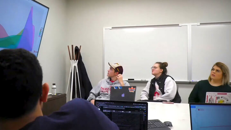 Students working on presentation together