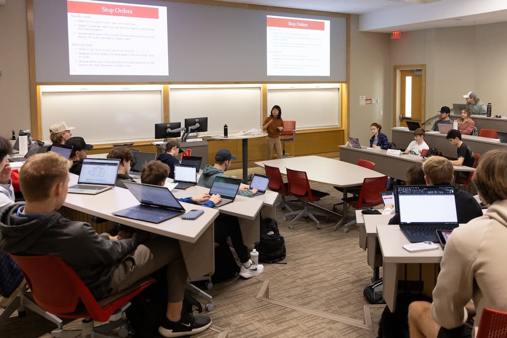 Students listening in a classroom.