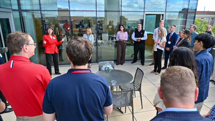 Students on the terrace with the Dean