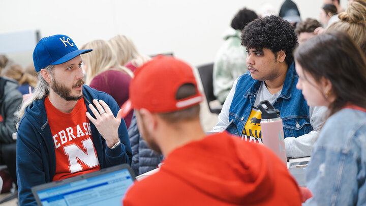 Andrew Hanna talks with students