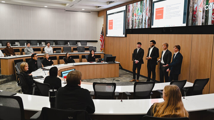 Four male students present at Conagra Brands