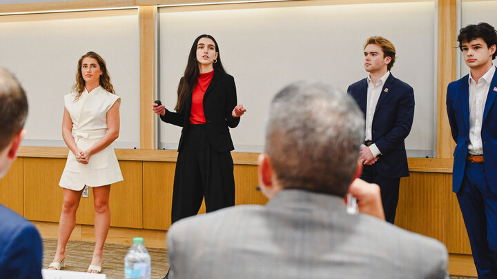 Students presenting in Hawks Hall
