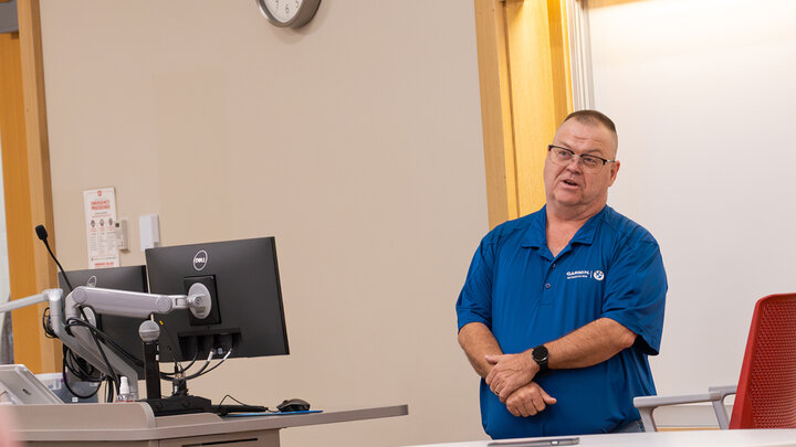 Scott Holweger talking in class