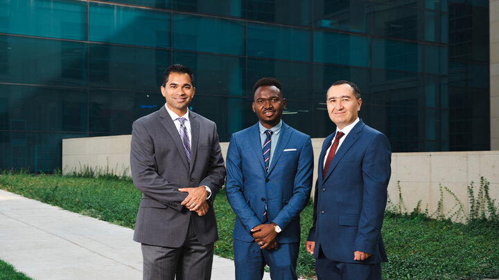 Varkey Titus Jr. (left), associate professor of management,Izu Mbaraonye (center), Ph.D. student in management and Mirzokhidjon Abdurakhmonov (right), assistant professor of management.