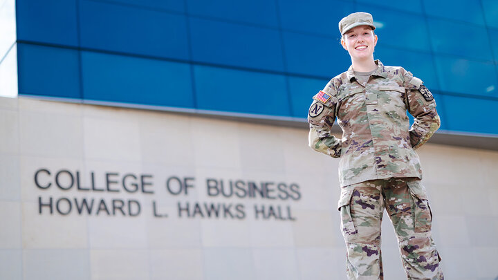Natalie Karrels in front of the College of Business Building.