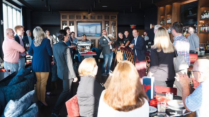 Sam Nelson, director of the Center for Entrepreneurship and associate professor of practice in management, addresses the new fellows and the center's supporters at a welcome reception for its fellows on September 30 at the Scarlet Hotel