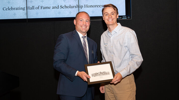 Jimmy Downes presenting award to Lane Knott