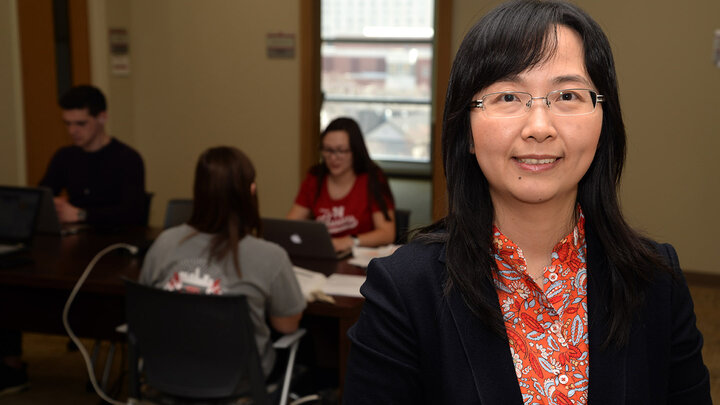 Dr. Biyu Wu's experience in audit fueled a desire to connect the dots between financial data and translate those numbers into insightful research.