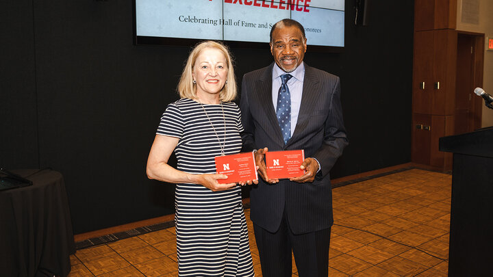 Audrey Went, ’82, and Barron Harvey, ’74, received their plaques representing their induction in the Nebraska School of Accountancy Hall of Fame.