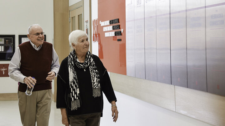 On their tour, Keith and Adine Kretschmer admired the student services and environmental branding around Hawks Hall.