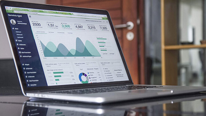 Computer with Business Graphic