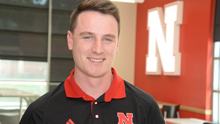 Robbie Palkert, a double major in management and economics, focused on courses and community efforts while recovering from Tommy John surgery.