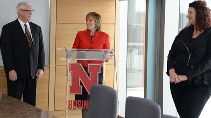 Dean Farrell, Don Stenberg, and Jennifer Davidson announce the Personal Finance Competition