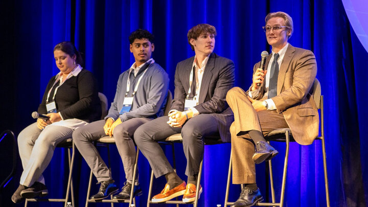 Kevin Crown speaks during a student panel