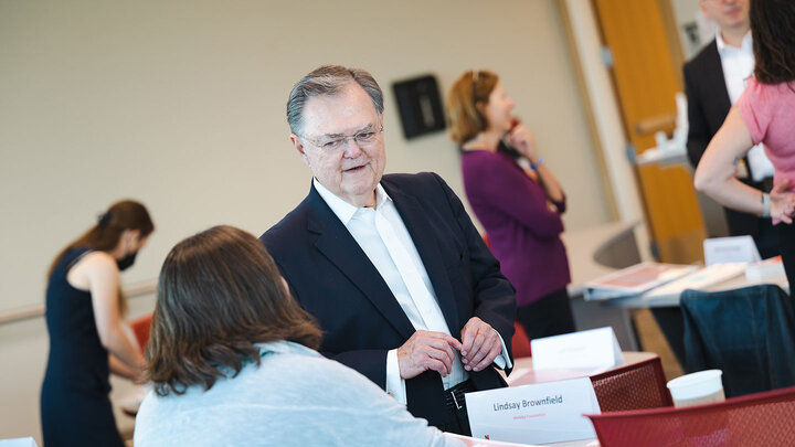Jim Croft talks to a nonprofit professional at a Nebraska Nonprofit Management Institute program.
