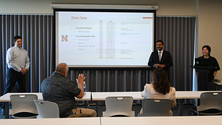 Students in SCMA 474 giving presentation by Nebraska Franchise leaders