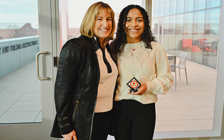 Cecilia poses with Dean Kathy Farrell