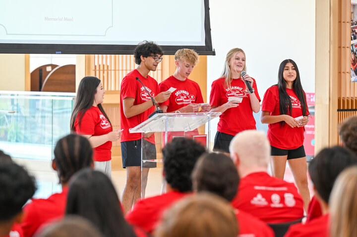 Students share their pitches in the atrium