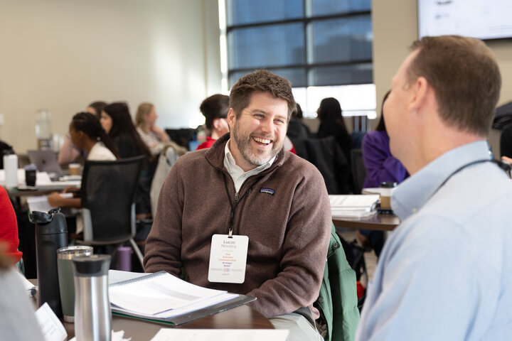 Lucas Novotny of University Housing talks with Jacob Sharrer of Husker Energy and Power during one of the strengths training activities.