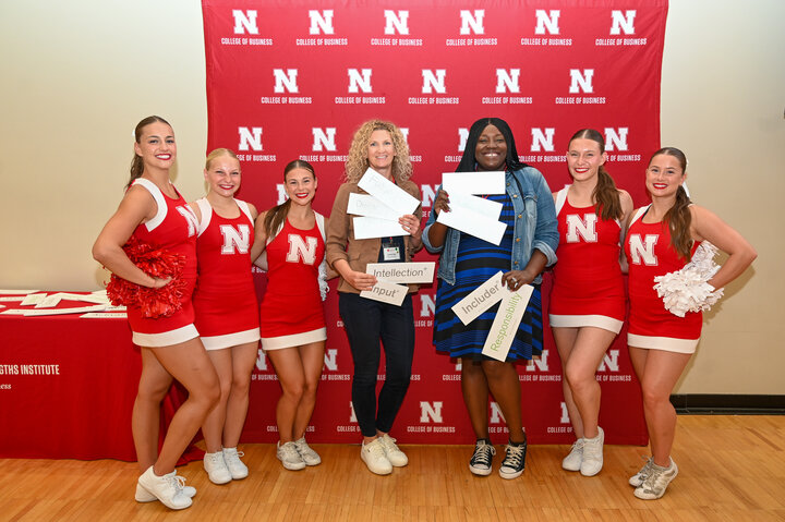 The Husker Spirit Squad poses for photos with the attendees at the Clifton Strengths Institute Summer Conference.