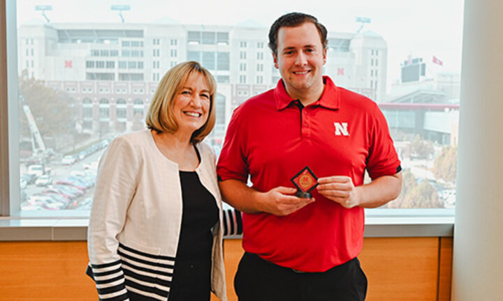 Jacob poses with Dean Kathy Farrell