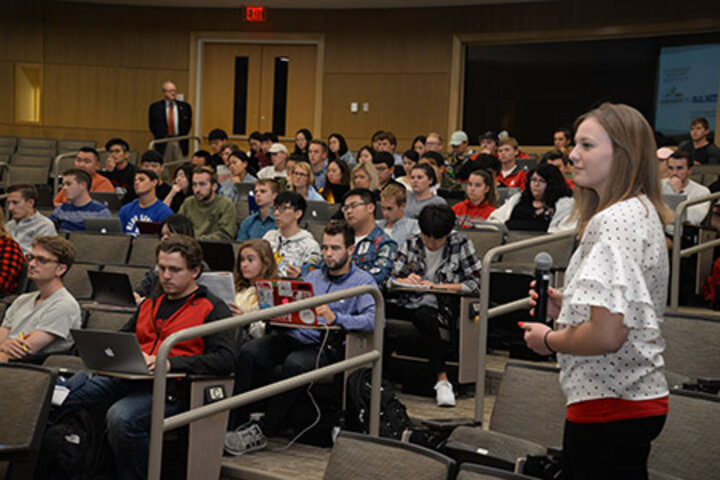 Allison Olmer facilitates the question and answers from the student audience.